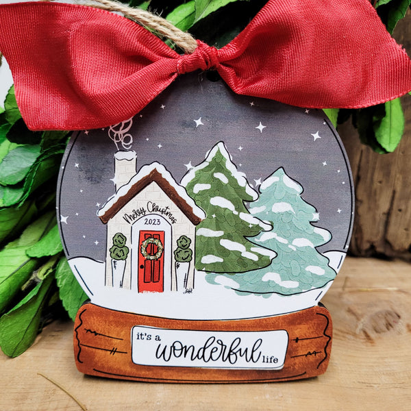 Handcrafted It's a Wonderful Life Cottage Scene Christmas Ornament by Lady A, part of the Artist Collection at Studio 29 Eleven