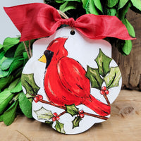 Cardinal on Holly Branch Christmas Ornament, fancy shape, Artist Collection by Lady A, Studio 29 Eleven.