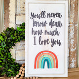 "You'll Never Know Dear" 3D Rainbow Wooden Sign, Heart and Home Collection, White Distressed, Adorable rainbow design, Raised 3D words, Rustic Home Decor.